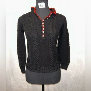 Elegant Black Sweater with Red Trim